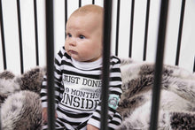 Load image into Gallery viewer, Baby wearing Just done 9 Months Inside® Newborn Romper