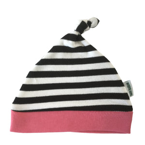 Black and white striped baby hat with pink edge and knot at the top