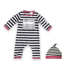 Load image into Gallery viewer, Just Done 9 Months Inside baby romper in black and white stripes with pink trim and baby hat in matching colours