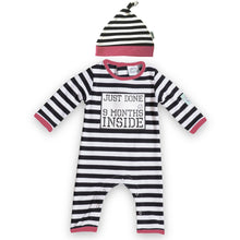 Load image into Gallery viewer, Baby Romper in black and white stripes with pink edging featuring Just Done 9 Months Inside slogan, and baby hat in matching colours
