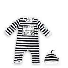 Load image into Gallery viewer, Black and White Stripy Baby Romper with Just Done 9 Months Inside slogan and matching stripy hat